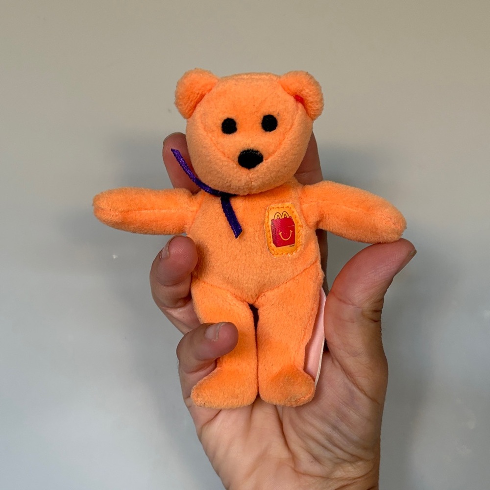 Happy Meal the Bear," a Ty Teenie Beanie Baby from McDonald's 2004